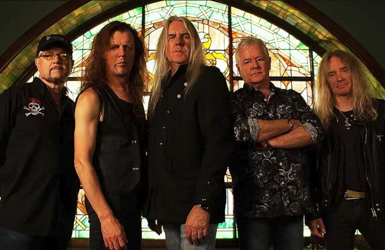Saxon’s Biff Byford Says It’s Possible Band Was Held Back By Iron Maiden