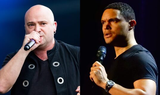 Disturbed Singer Blasts “Daily Show” Host For Ripping Joe Rogan