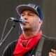 Rage Against The Machine Guitarist Knocked Off Stage While Playing (W/Video)