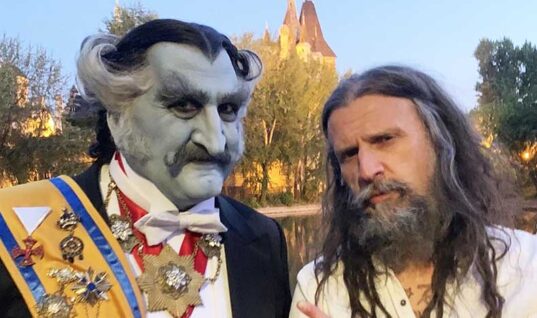Rob Zombie Unveils First Poster For “The Munsters” & Shares Update On Film