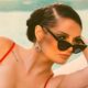Saraya Calls Herself A “60s Girl” In Throwback Swimsuit Photoshoot