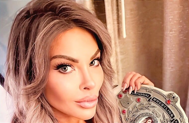 NWA Star Natalia Markova Poses In Red Lingerie As “Your Early Christmas Present”